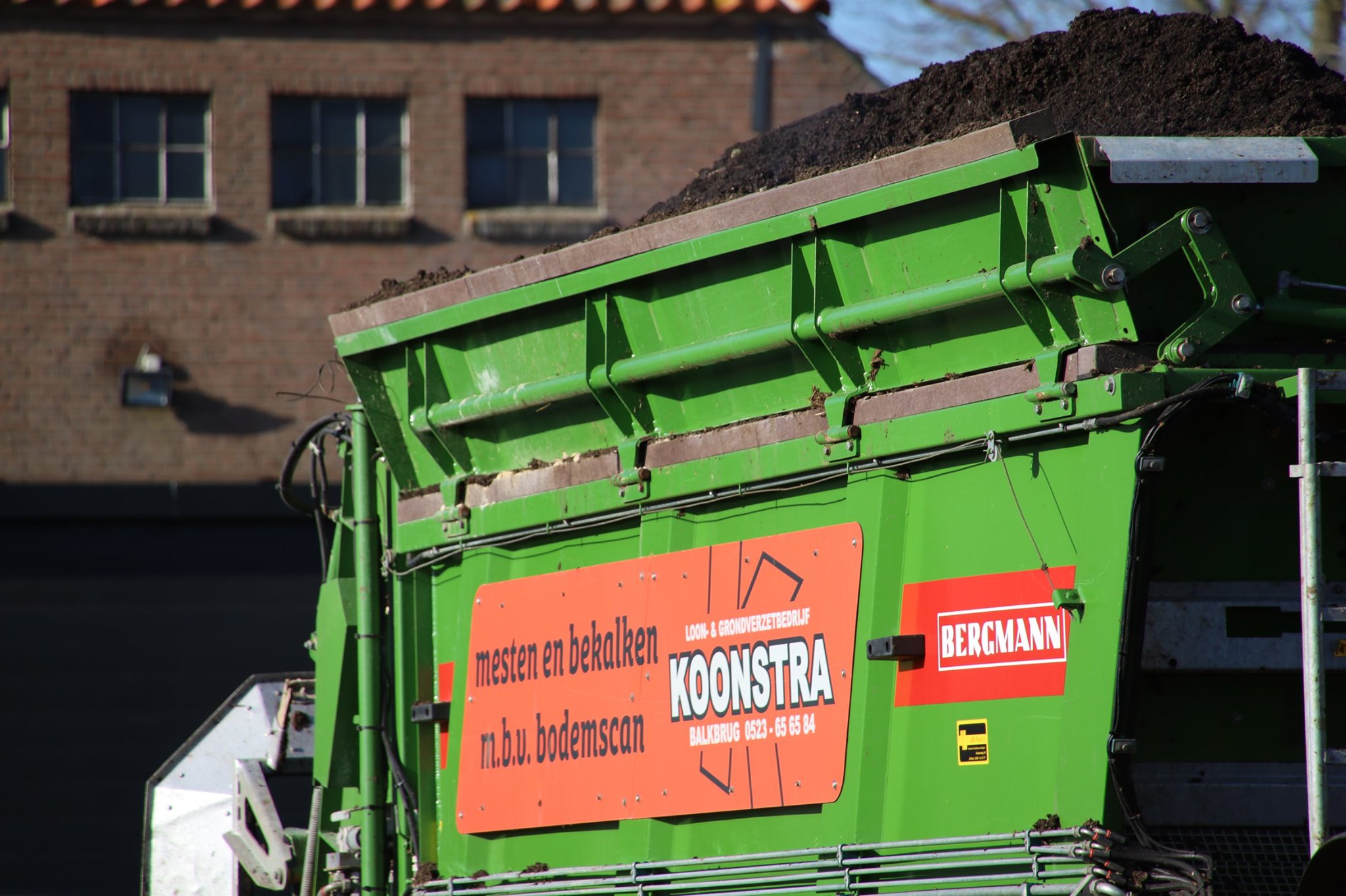 Compost strooien